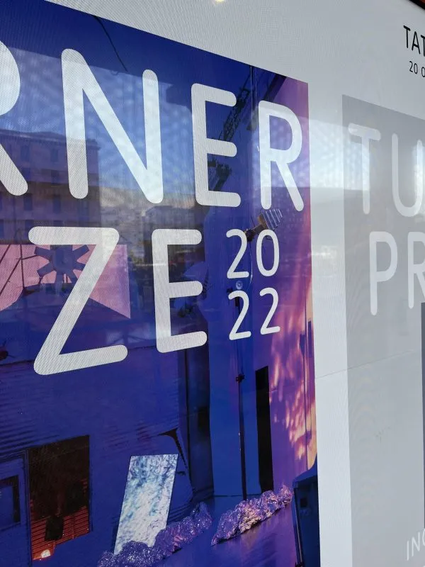 Close-up of a window graphic installation at the Tate gallery, displaying printed detail.