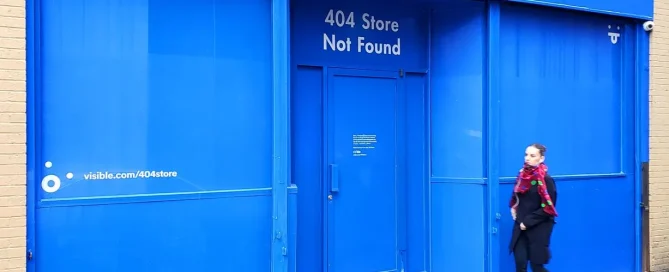 Contra Vision one-way window film showing a 404 store not found error message on an empty retail unit.