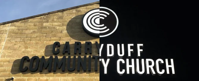 Day and night comparison of dual colour backlit channel letter signage at Carryduff Community Church.