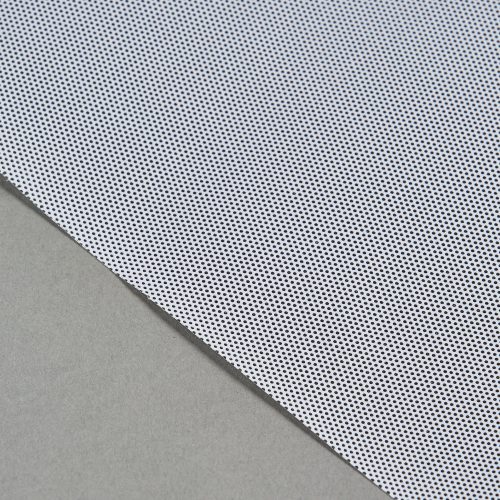 Close-up detail of TWPAG40HD perforated film, showing even hole spacing against a solid background.