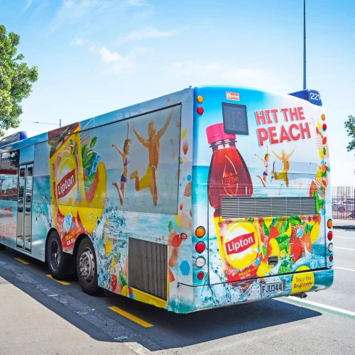 Lipton advert printed on Contra Vision 50 percent perforated window film wrapped on a New Zealand passenger bus.