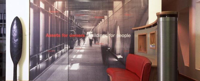 A modern office partition featuring Contra Vision one-way window graphics showcasing an architectural corridor design.