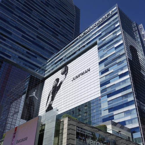 Massive Nike Jumpman advertising mural on the exterior of the JW Marriott Los Angeles hotel building.