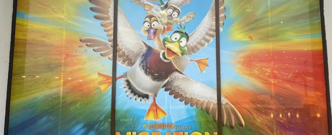 Full-size shop window graphic displaying the Illumination movie Migration at Showcase Cinema de Lux, Nottingham.